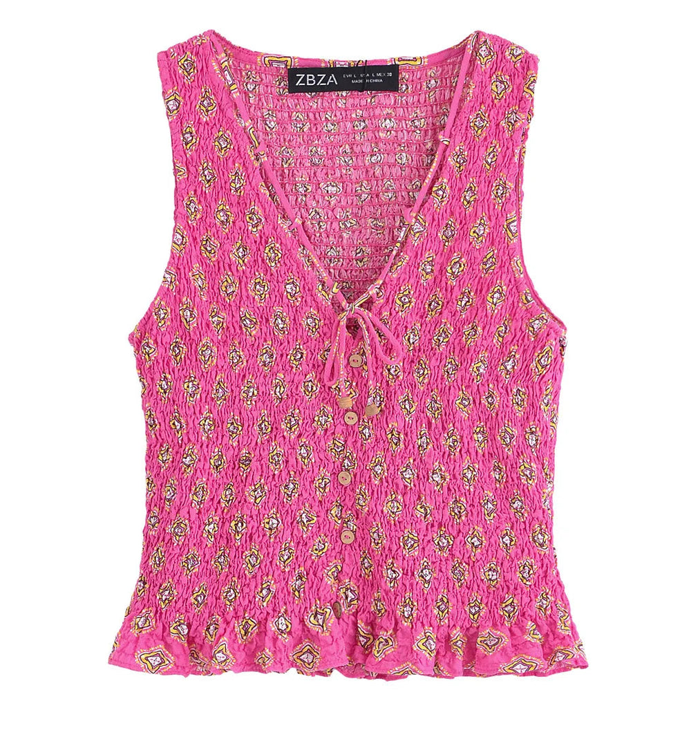 Pink floral sleeveless top on a white background