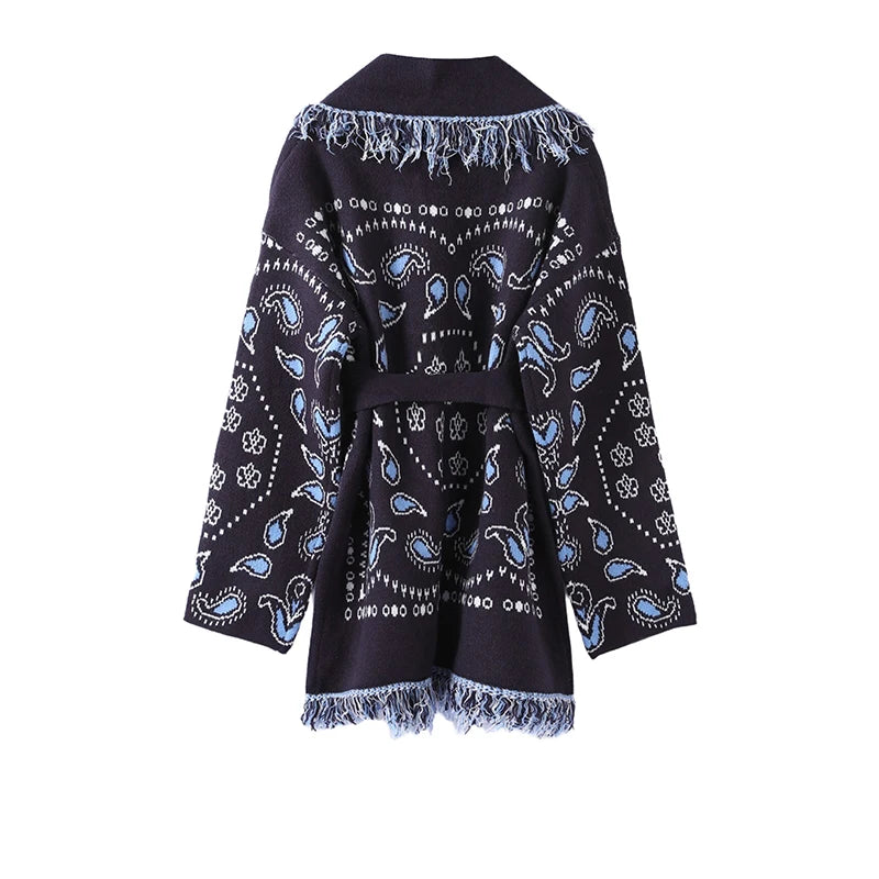 Black scarf with blue paisley patterns on a white background