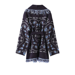 Black scarf with blue paisley patterns on a white background