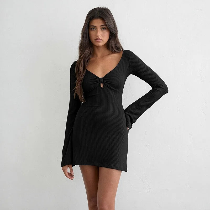 Black ribbed v-neck mini dress with long bell sleeves