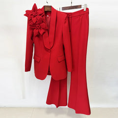 Red suit with floral details on a white background
