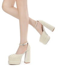 White textured platform high heels on a white background