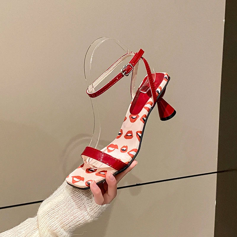 Red and white lip print ankle strap heels