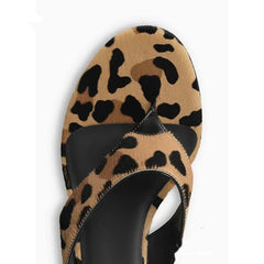 Close-up of leopard print stiletto thong sandal toe