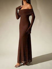 Brown off-shoulder evening gown on a plain background