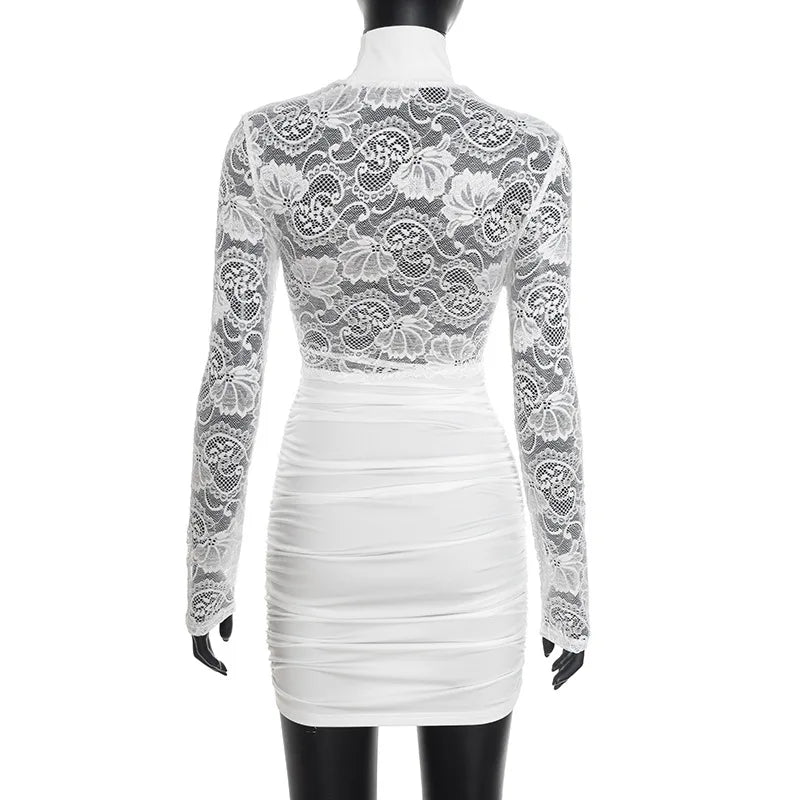 White lace dress on a mannequin against a white background