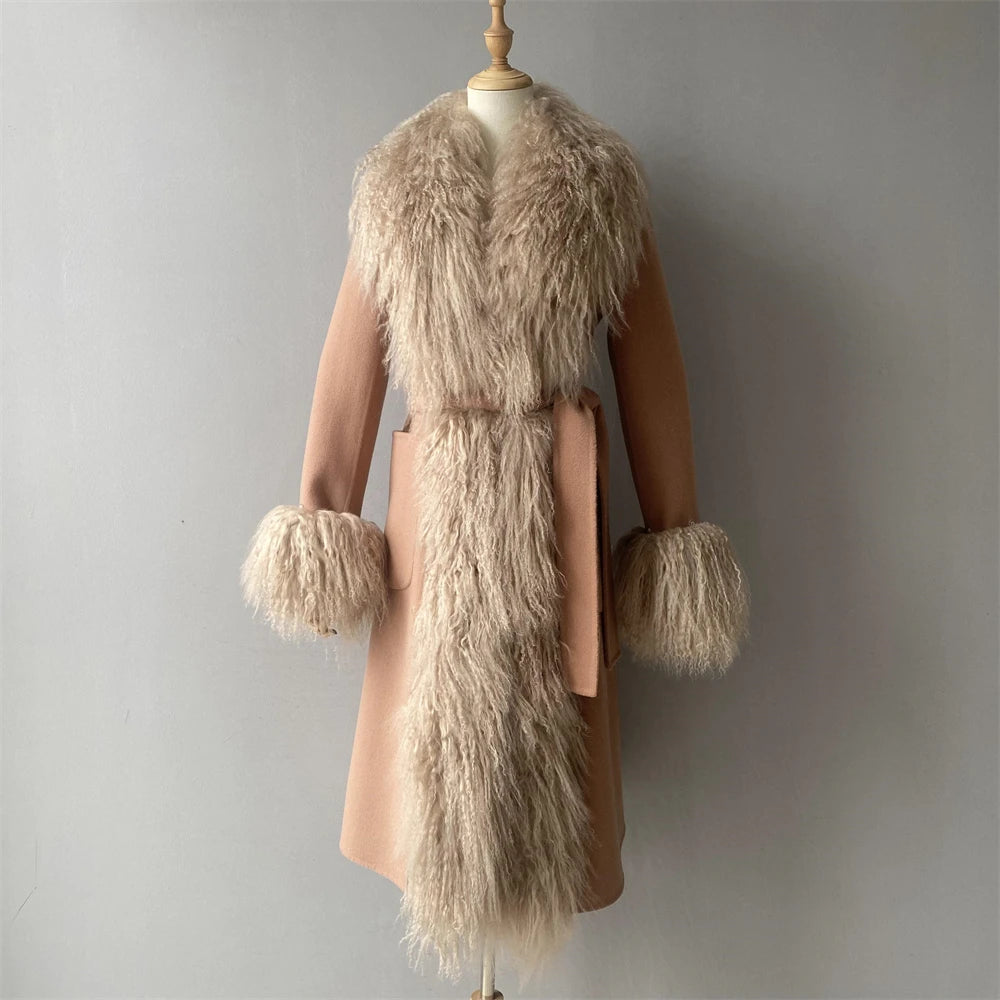 Beige coat with fur trim on a mannequin against a gray background