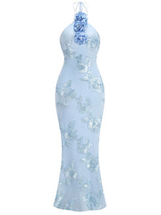 Light blue evening gown with floral embellishments on a white background