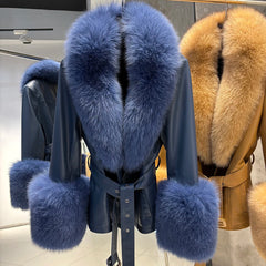 Blue fur-trimmed leather coat on a rack with another coat in the background.
