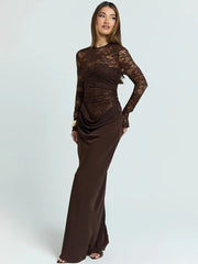 Woman wearing a brown lace dress on a white background