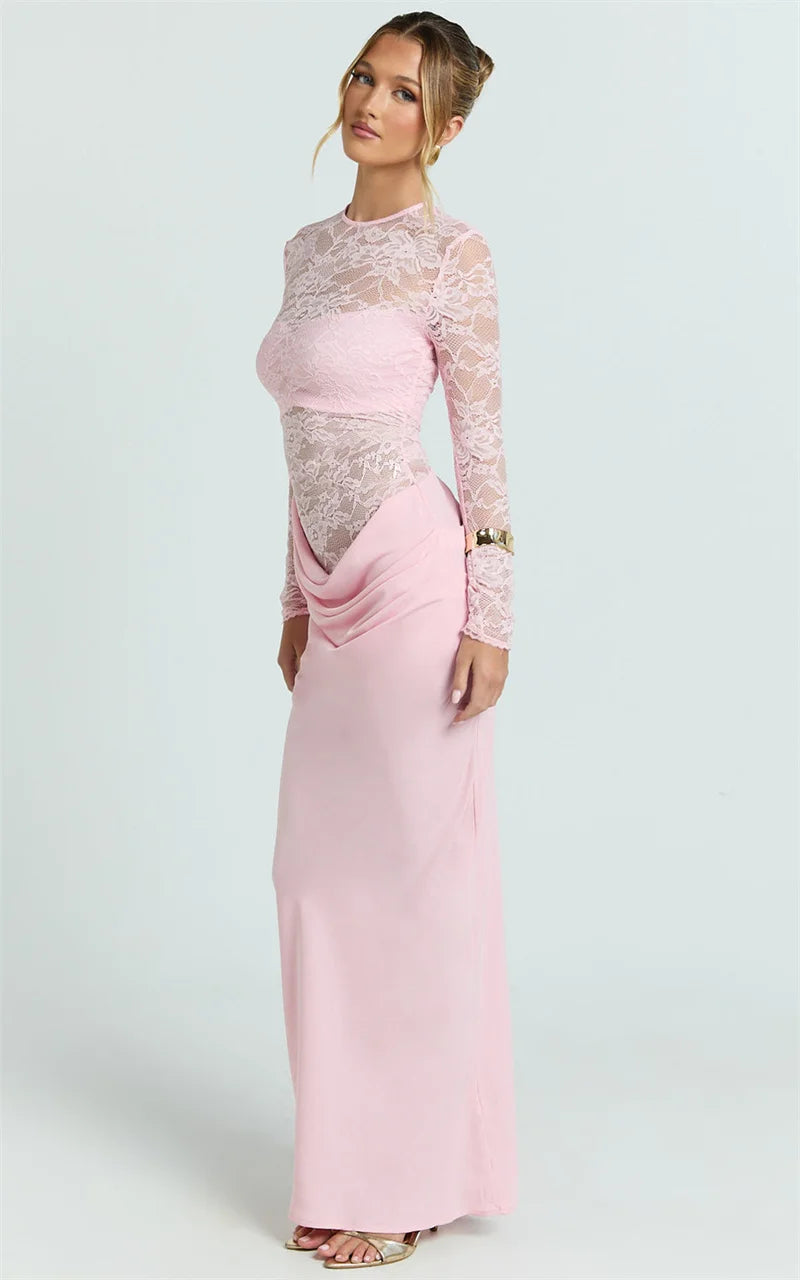 Woman wearing a pink lace dress on a white background