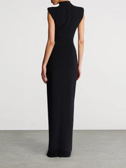 Black evening gown on a plain background