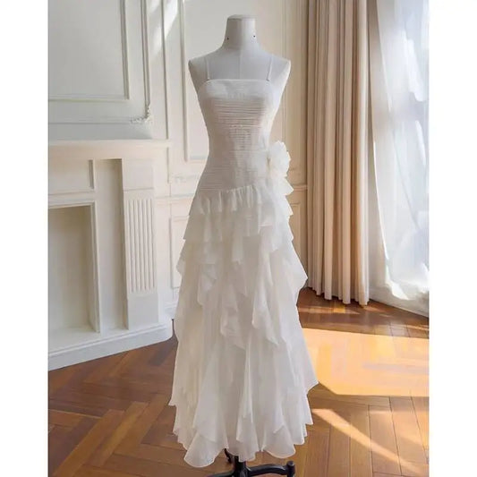 Strapless ruffle trim dress on a mannequin
