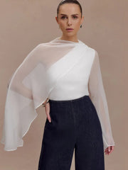 Asymmetrical draped cape sleeve blouse with sheer overlay front view