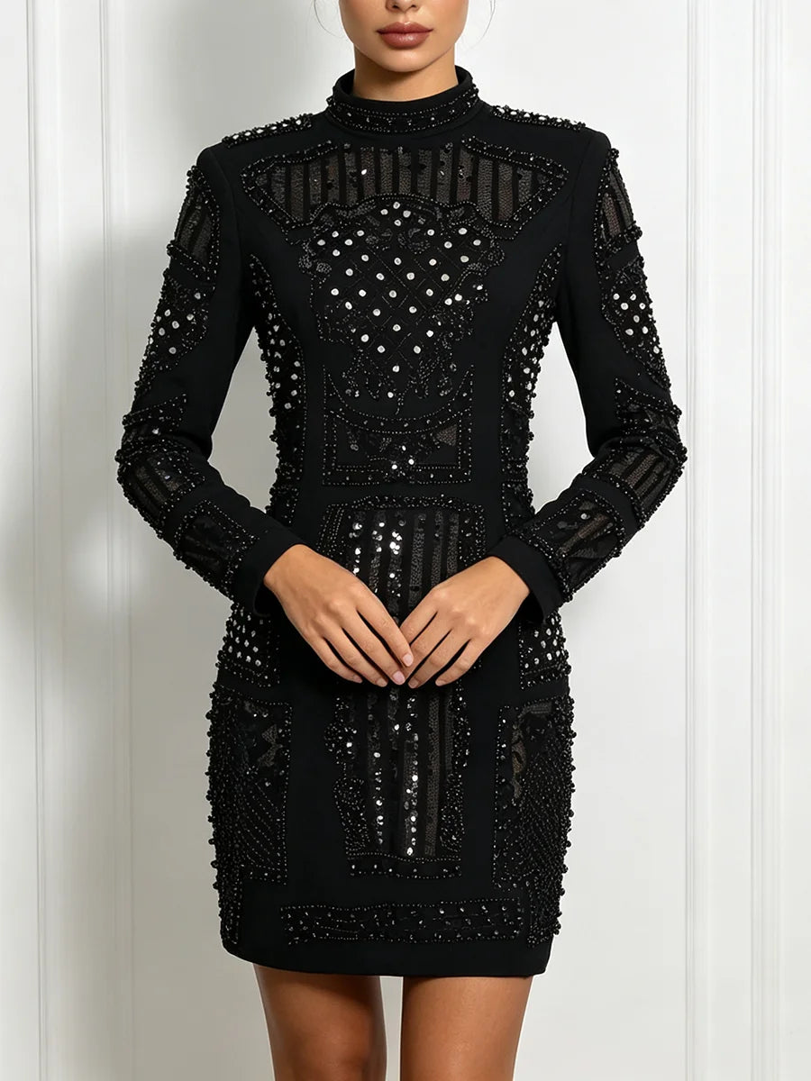 Close-up of black embellished high neck mini dress details