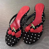 Polka dot kitten heel flip flops with cherry embellishment