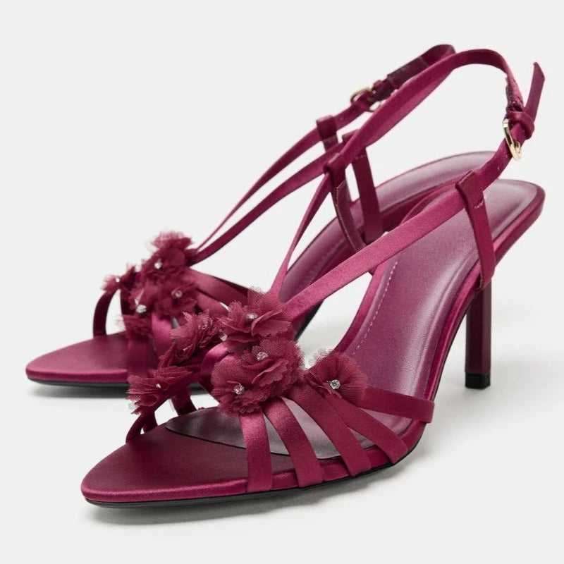 Satin heeled sandals with floral embellishments in red