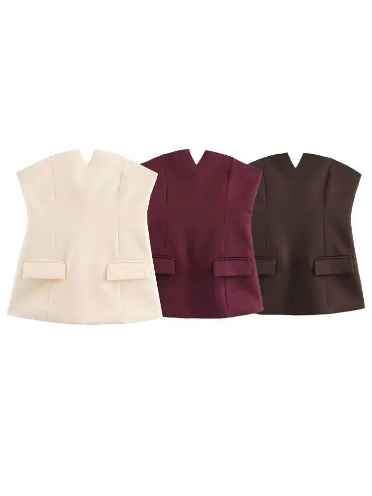 Three vests in beige, burgundy, and brown on a white background