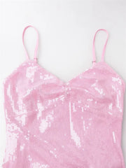 Pink sequin dress on a white background