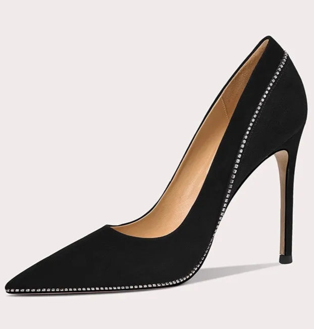 Black high-heeled shoe on a light gray background