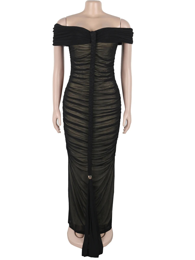 Black off-shoulder dress on a mannequin against a white background