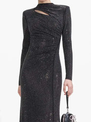 Black sequin dress with long sleeves on a white background