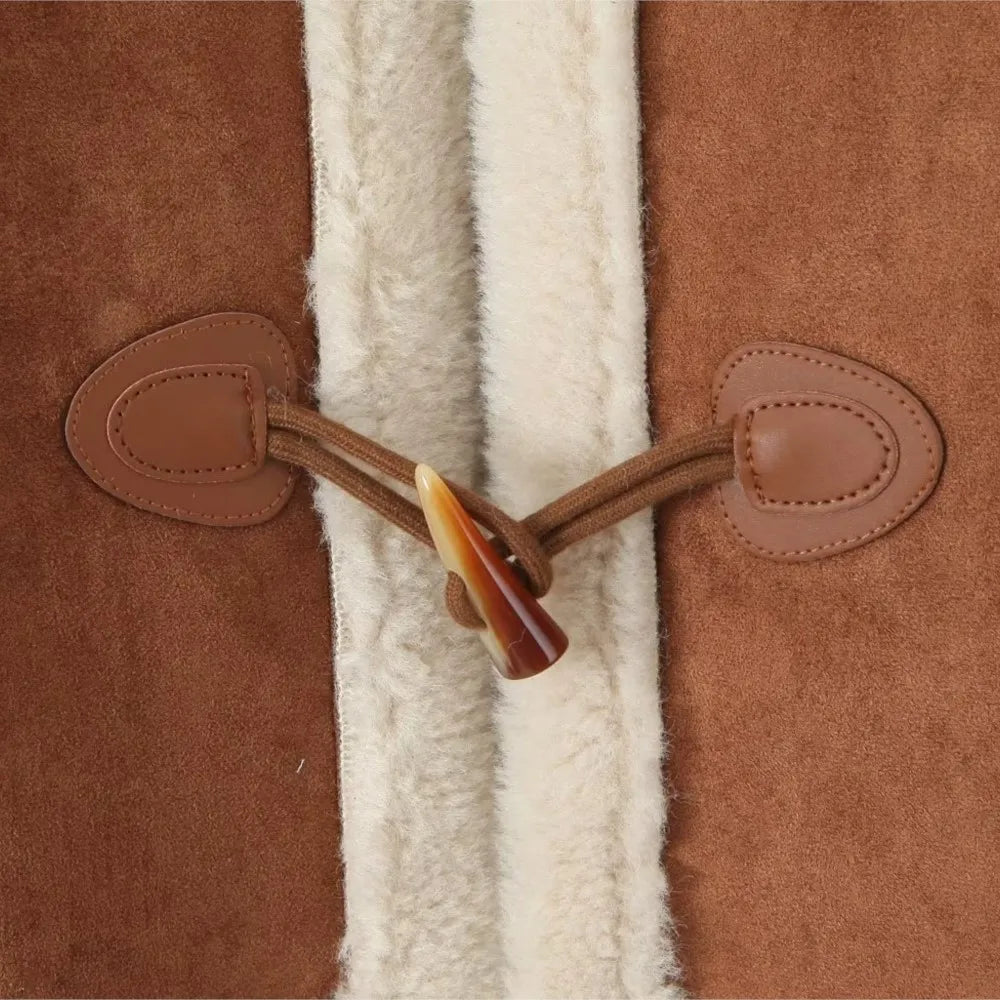 Close-up of a brown leather duffel bag with a white fur lining.