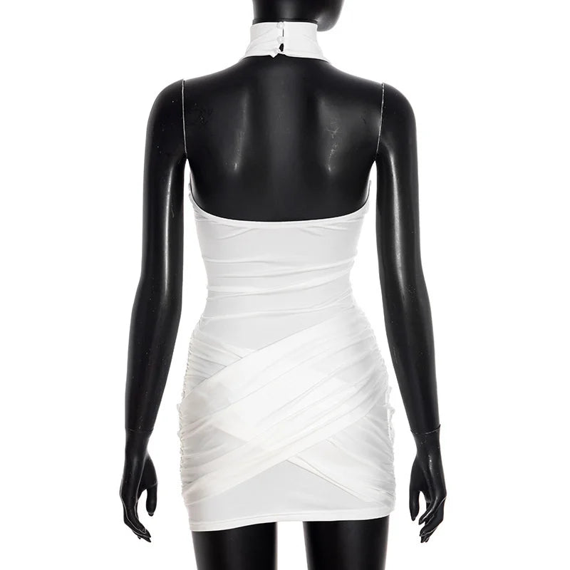 White dress on a black mannequin against a white background