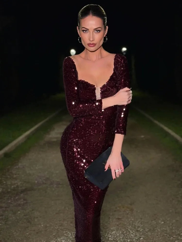 Burgundy off shoulder mesh sequin maxi gown.