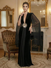 Black velvet maxi dress with V-neck and cloak sleeves