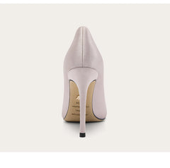 Light gray high-heeled shoe on a white background