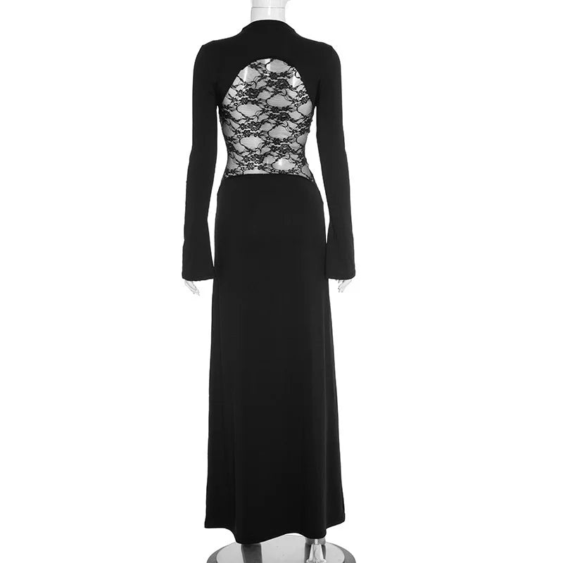 Black dress with lace detailing on a mannequin against a white background