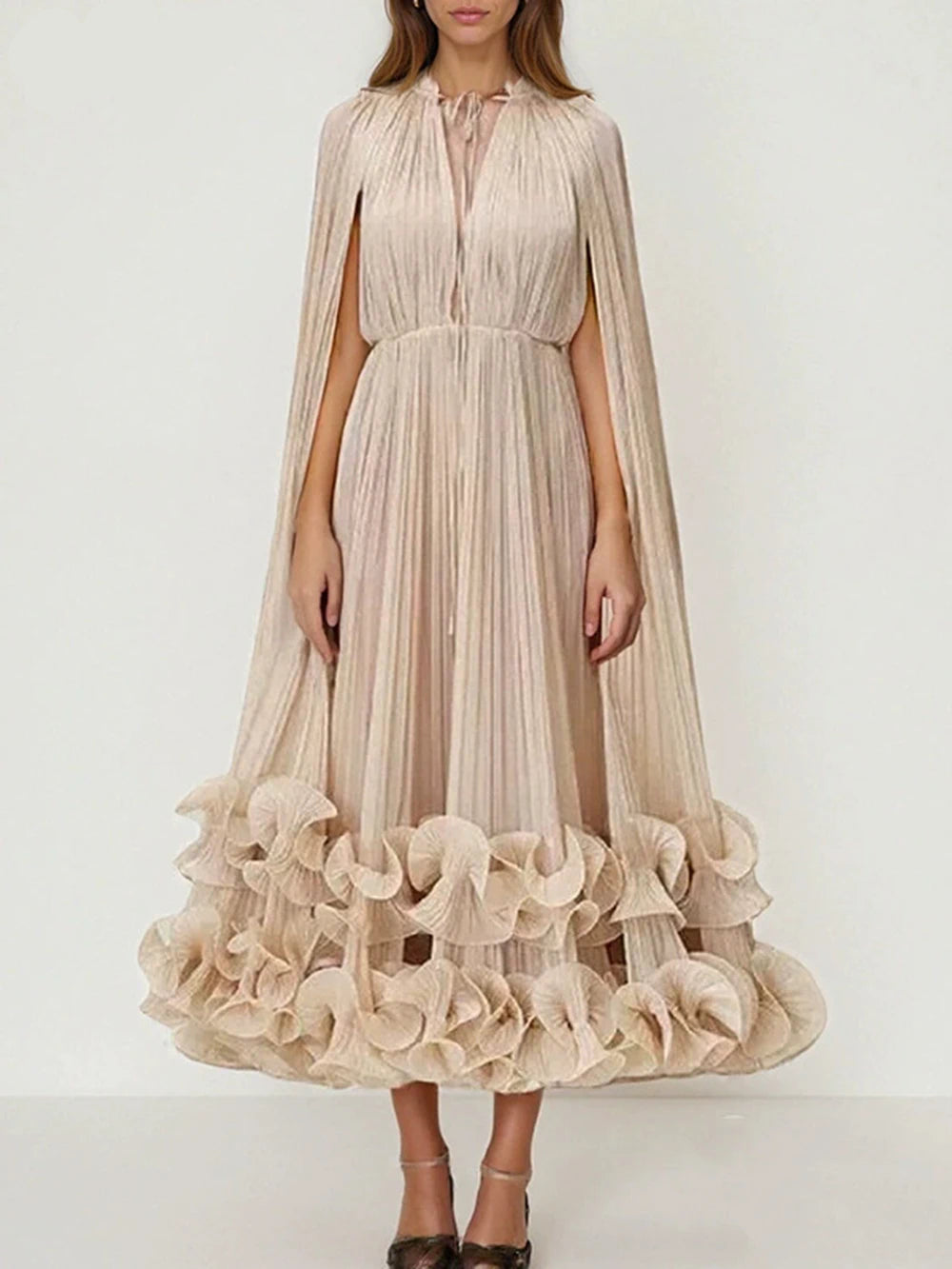 Beige dress with ruffled skirt and cape on a white background, brand 'Modphy' visible.