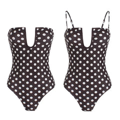 Two styles of polka dot one-piece swimsuits, strapless and with straps