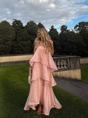 Strapless ruffle maxi dress in a garden setting