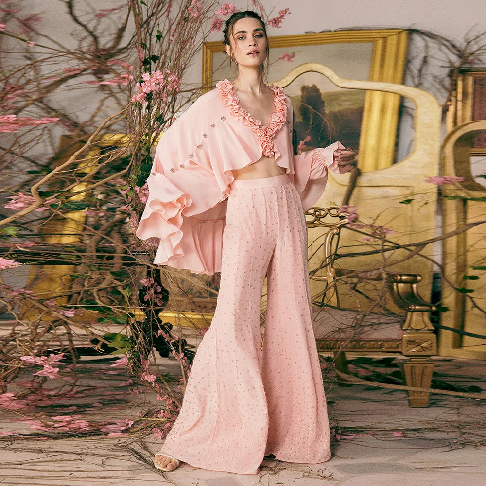 Pastel ruffled cape V-neck crop top with embellished flare trousers