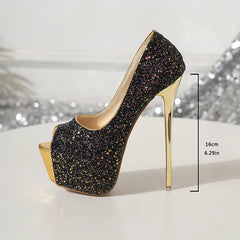 Black glitter high heel shoe with gold sole on a white background