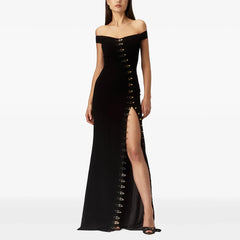 Black off shoulder maxi dress with metal buckle detailing and high slit.