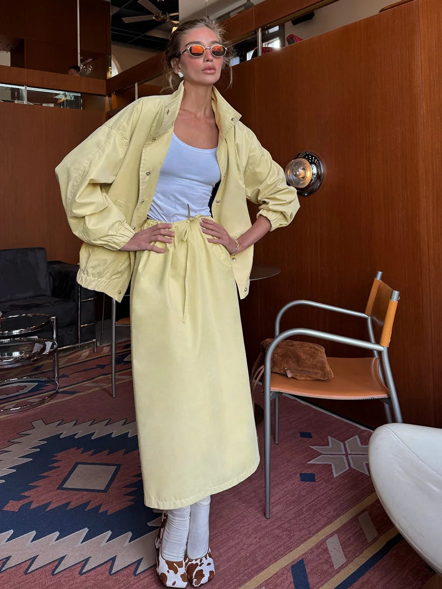 Interior view of yellow utility jacket and midi skirt set