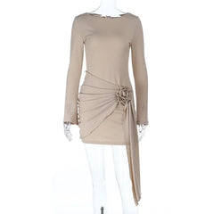 Beige dress with a floral detail