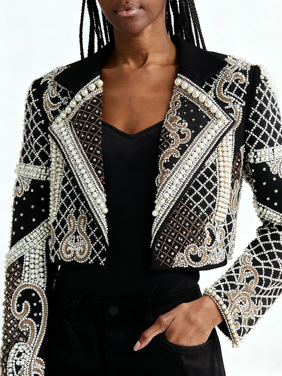 Black embellished jacket worn by a model