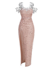 Rose gold evening gown with silver floral embellishments on a white background