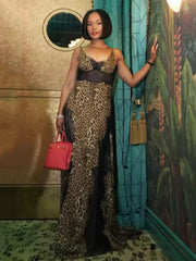 Model wearing a leopard print lace maxi dress with black lace detailing.