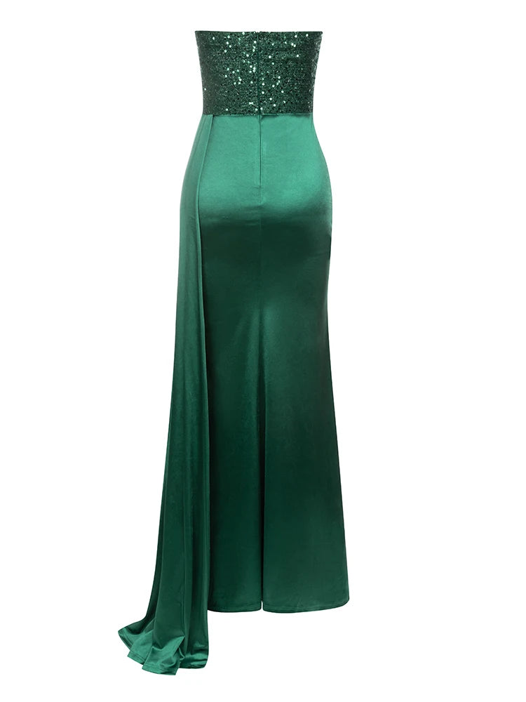 Green evening gown with sequined top on a white background