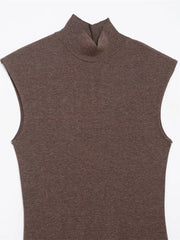 Brown sleeveless turtleneck top on a white background