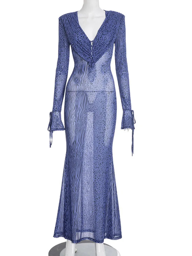 Blue lace dress on a mannequin against a white background
