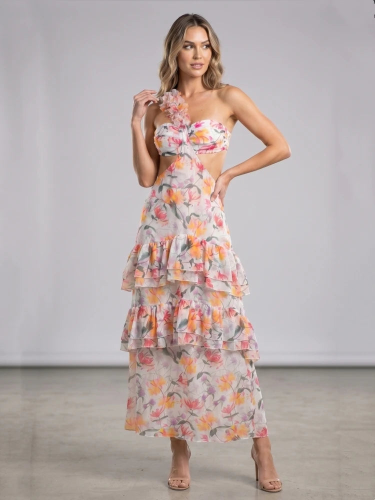 Floral asymmetrical cut-out ruffle maxi dress studio shot