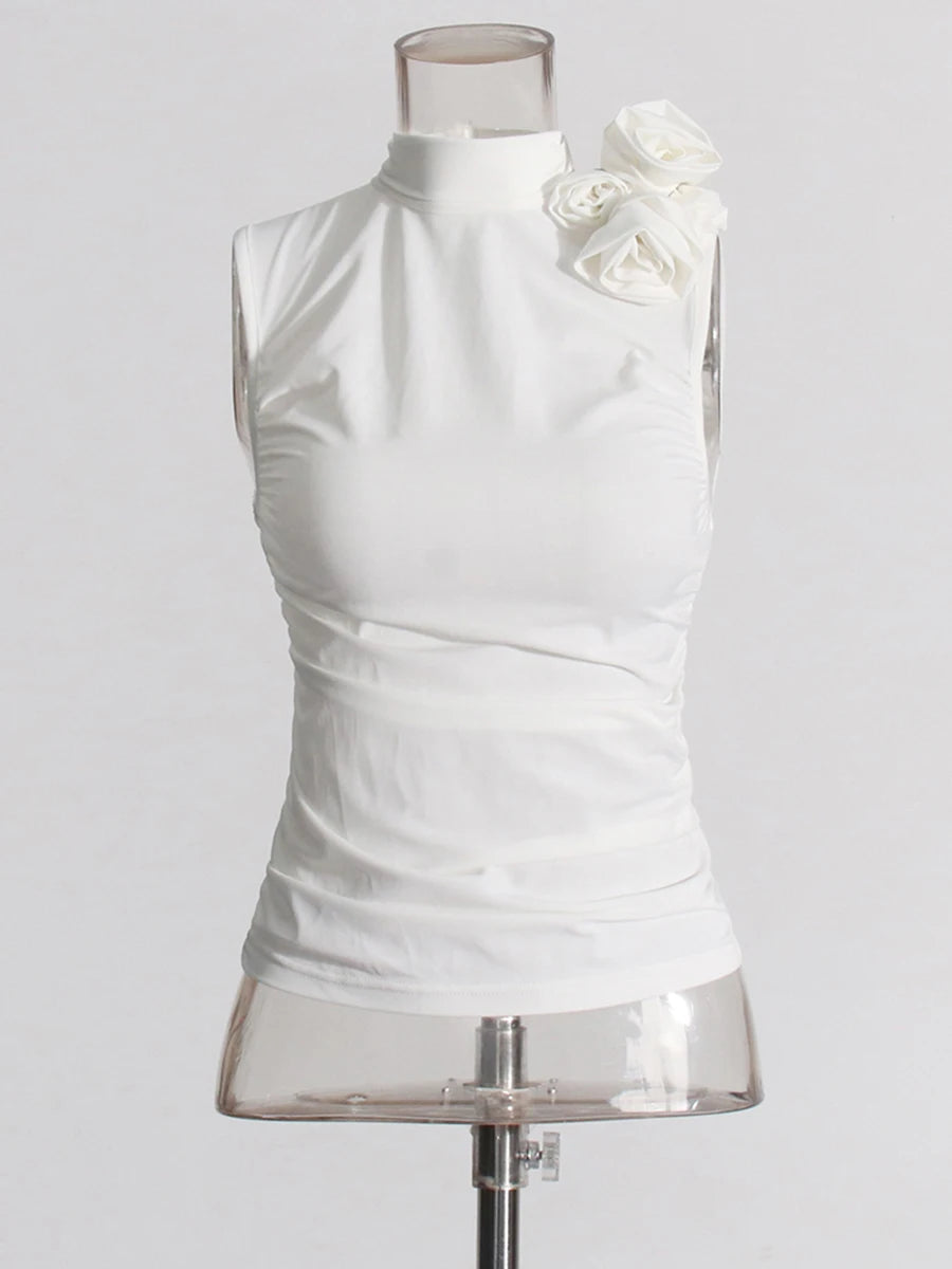 White sleeveless top with floral details on a mannequin against a white background