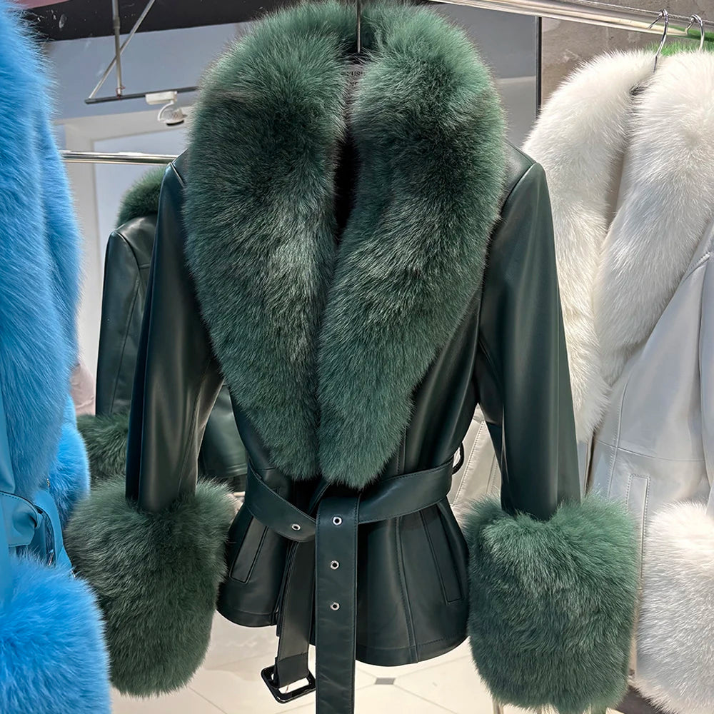Green fur-trimmed leather jacket on a mannequin with a blurred background