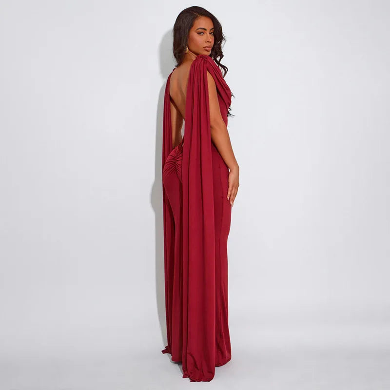 Red evening gown with open back on a white background